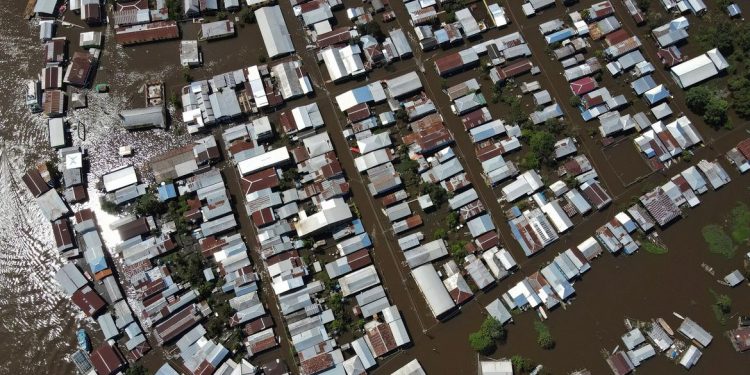 An aerial view of the town of Anama, flooded by water from the Solimoes river in Amazonas State, Brazil May 14, 2021. Picture taken May 14, 2021. Picture taken with a drone. REUTERS/Bruno Kelly