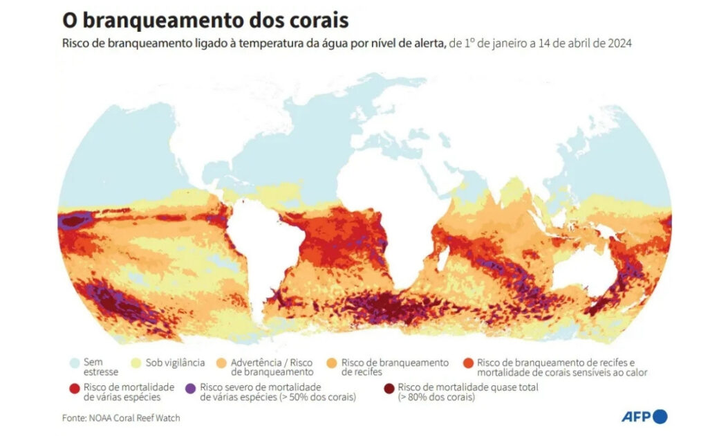 Mapa global destacando zonas de risco climático e pontos de inflexão ecológica de colapso dos recifes de corais.