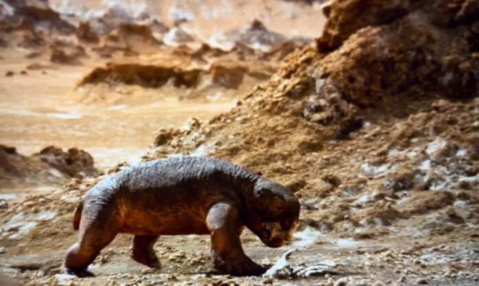 Ilustração de Lystrosaurus em ambiente árido após extinção em massa no período Triássico